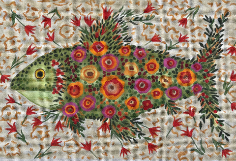Decorative needlepoint of a fish surrounded by flowers on a patterned background